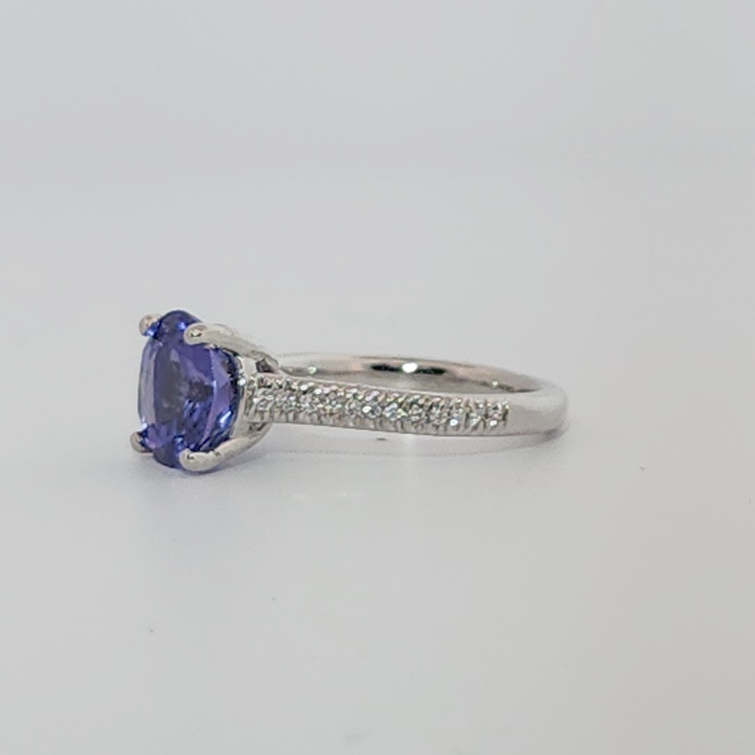 Modified Brilliant Cut, Round Shape, Bluish Violet Tanzanite (2.80CT, 8.89 - 9.01 x 5.53 mm), Mounted at Platinum 950 ring with Natural Diamonds (0.18 CTW E/F-SI). GIA Certified (5231466569). Size 5.25