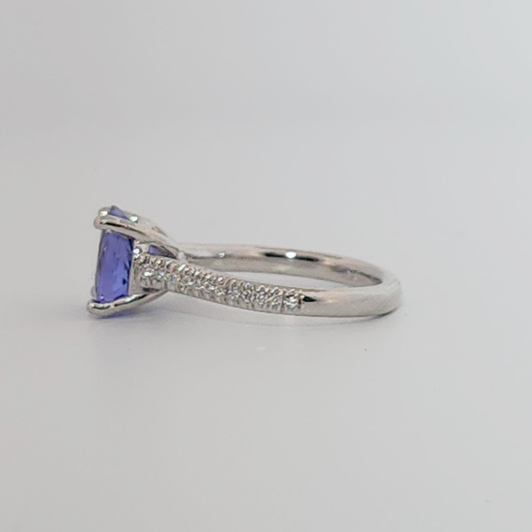 Modified Brilliant Cut, Round Shape, Bluish Violet Tanzanite (2.80CT, 8.89 - 9.01 x 5.53 mm), Mounted at Platinum 950 ring with Natural Diamonds (0.18 CTW E/F-SI). GIA Certified (5231466569). Size 5.25