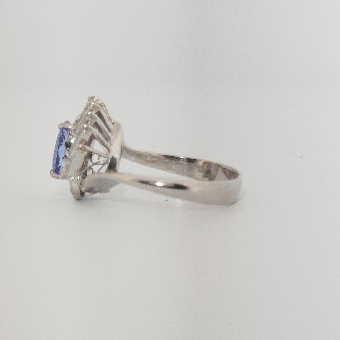 Oval Faceted, AAA, Natural Tanzanite (1.15CT, 8x6mm), Mounted on Platinum 900 Ring with Natural Diamonds (0.35 CTW, E/F-VS). Size 6