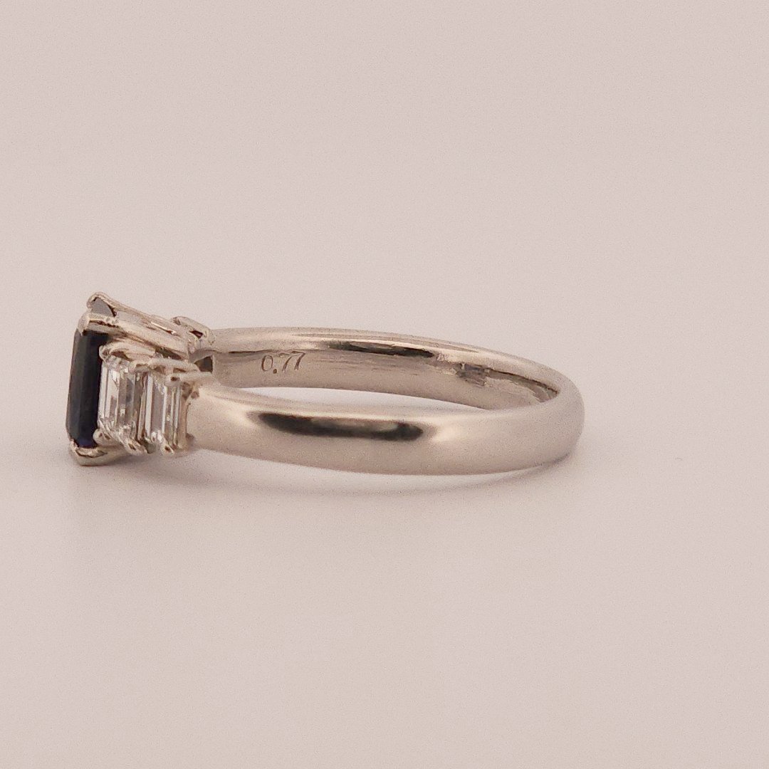 Emerald Step-Cut, AAA Natural Blue Sapphire (1.15CT, 7x5mm), Mounted on Platinum 900 Ring with Natural Diamonds (0.77 CTW, E/F VS1/VS2). Size 7.25