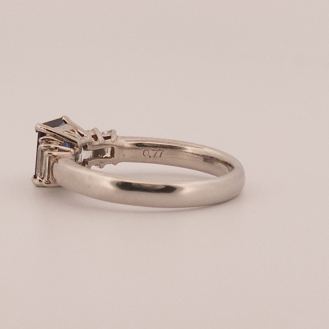 Emerald Step-Cut, AAA Natural Blue Sapphire (1.15CT, 7x5mm), Mounted on Platinum 900 Ring with Natural Diamonds (0.77 CTW, E/F VS1/VS2). Size 7.25