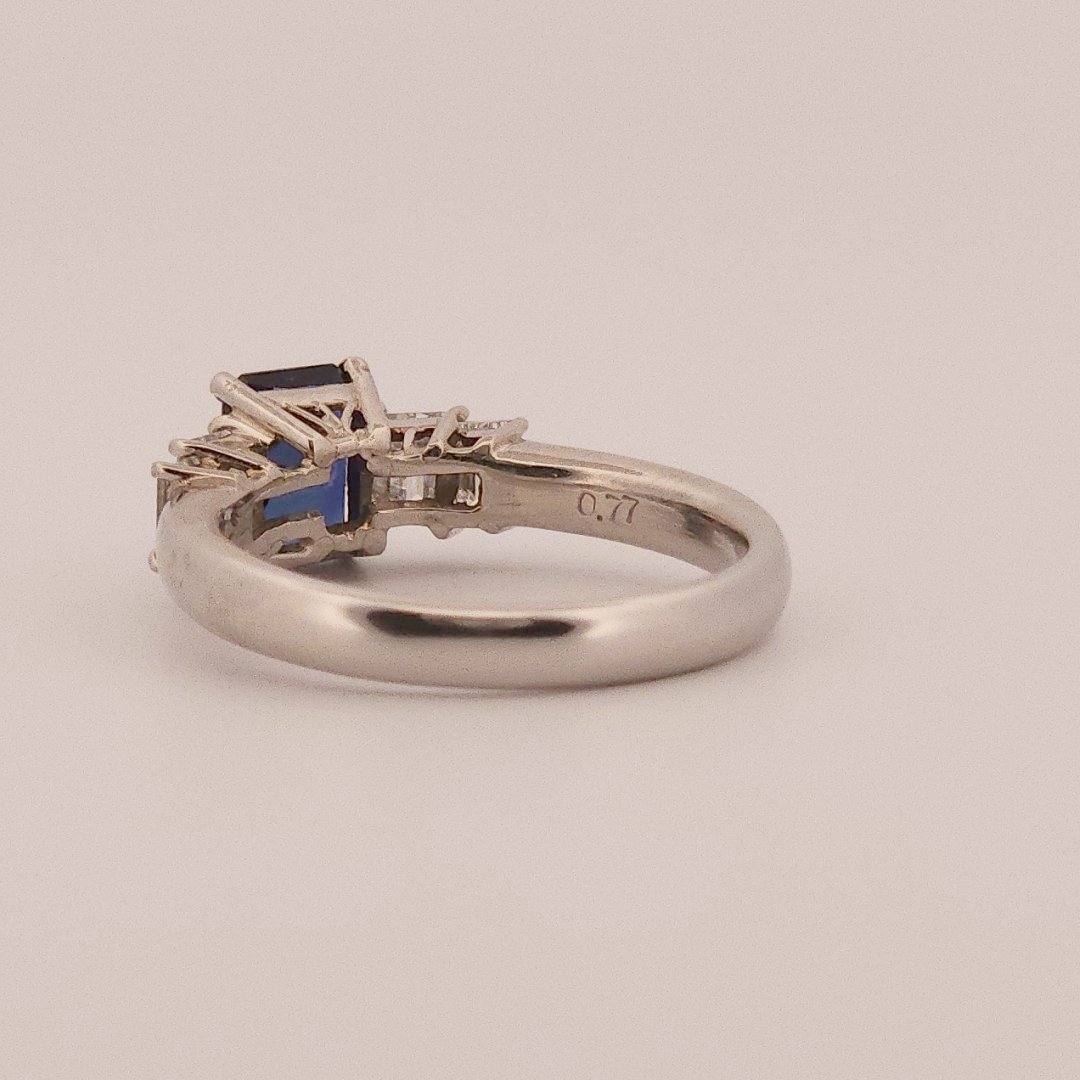 Emerald Step-Cut, AAA Natural Blue Sapphire (1.15CT, 7x5mm), Mounted on Platinum 900 Ring with Natural Diamonds (0.77 CTW, E/F VS1/VS2). Size 7.25