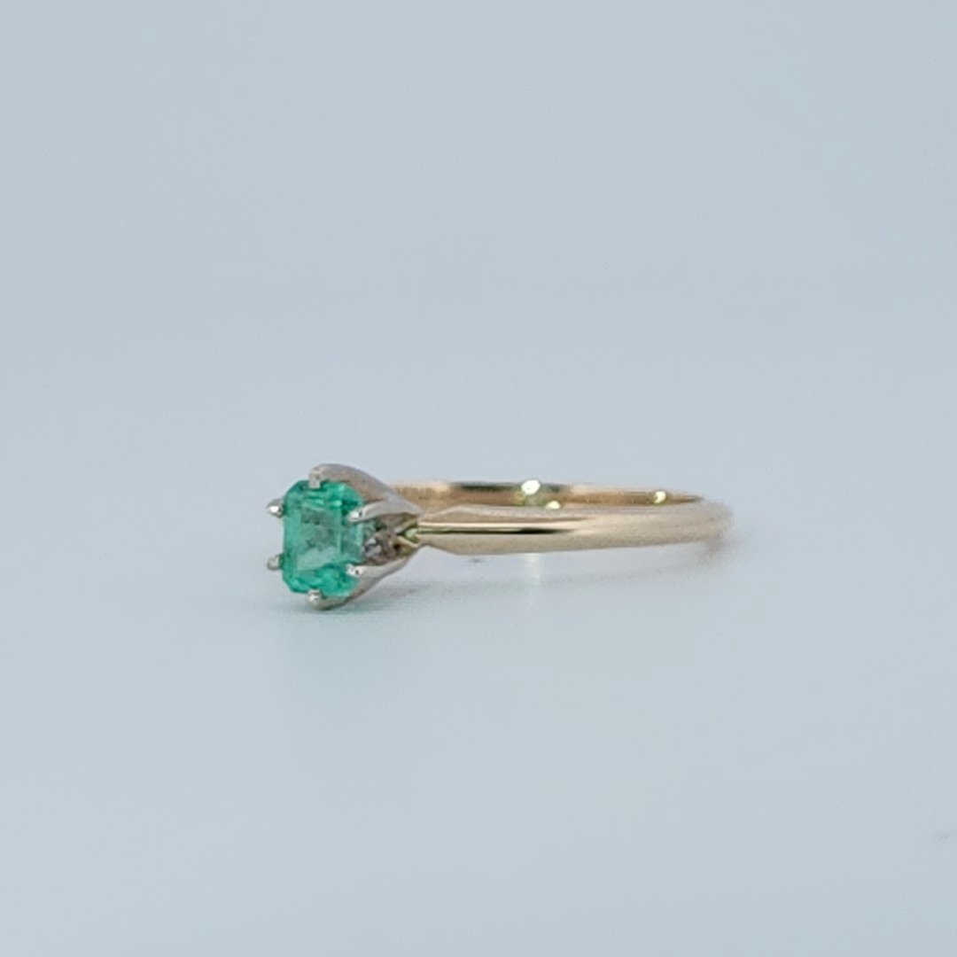 Step Emerald Cut,  Natural Columbian Emerald(0.30CT, 4.65x3.55mm), Mounted on 14K White Gold Prongs and 14K Yellow Gold Shank. Size 6