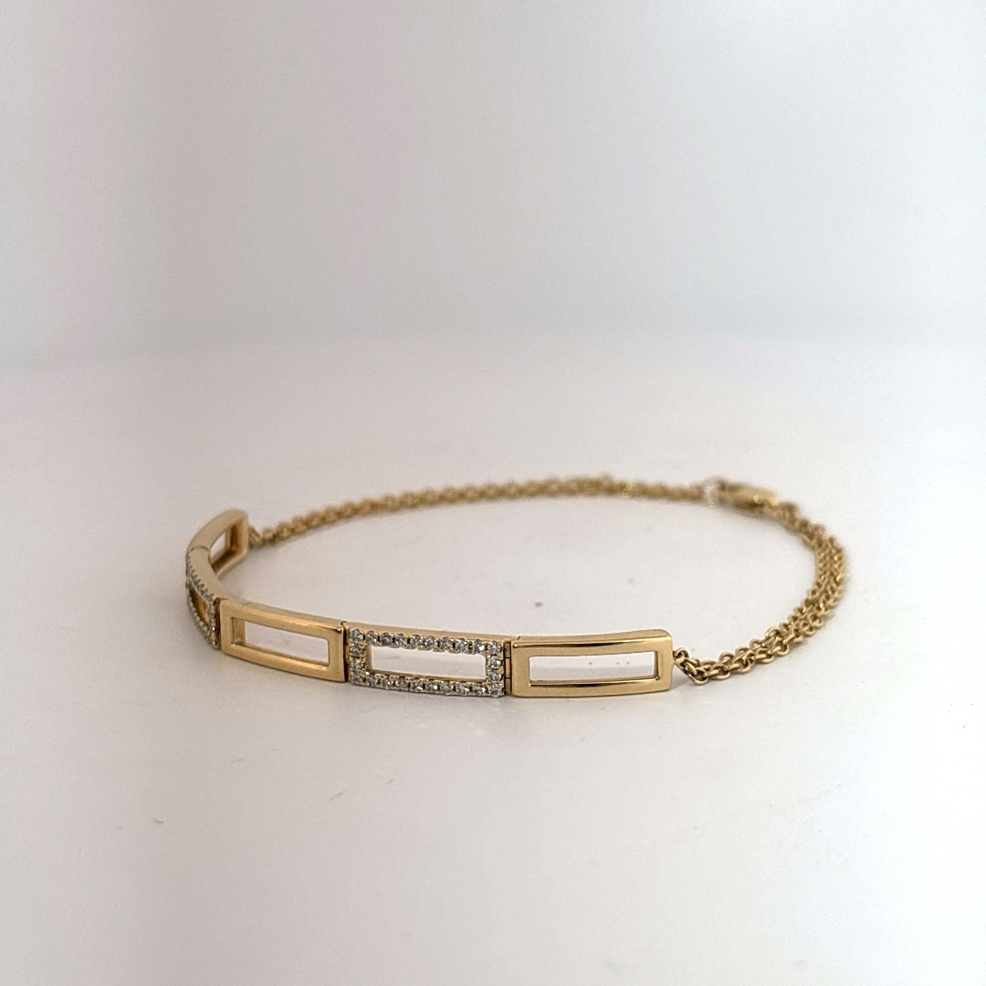 Female Geometric Bracelet, 14K Yellow Gold with diamond accents totaling 0.24ct.