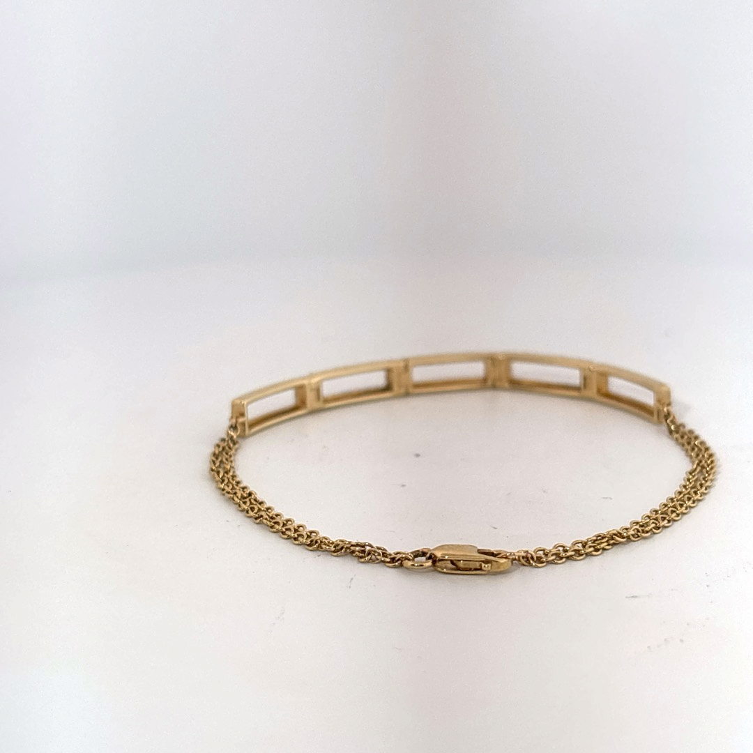 Female Geometric Bracelet, 14K Yellow Gold with diamond accents totaling 0.24ct.