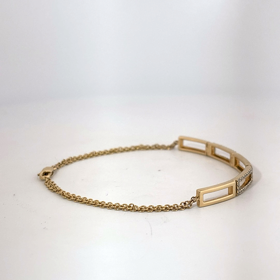 Female Geometric Bracelet, 14K Yellow Gold with diamond accents totaling 0.24ct.