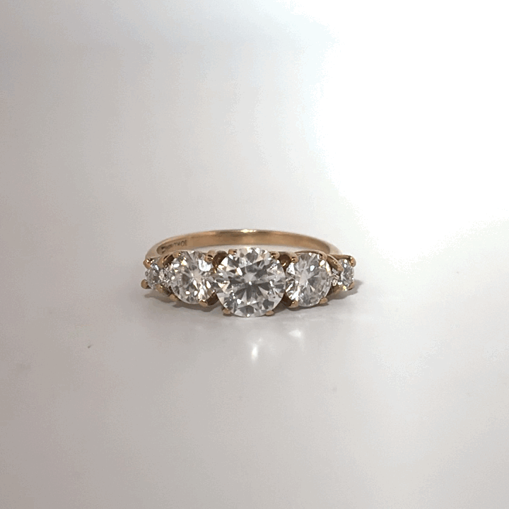 10K Yellow Gold Ring, set with 5 Moissanites, 2.6g, Size 6.